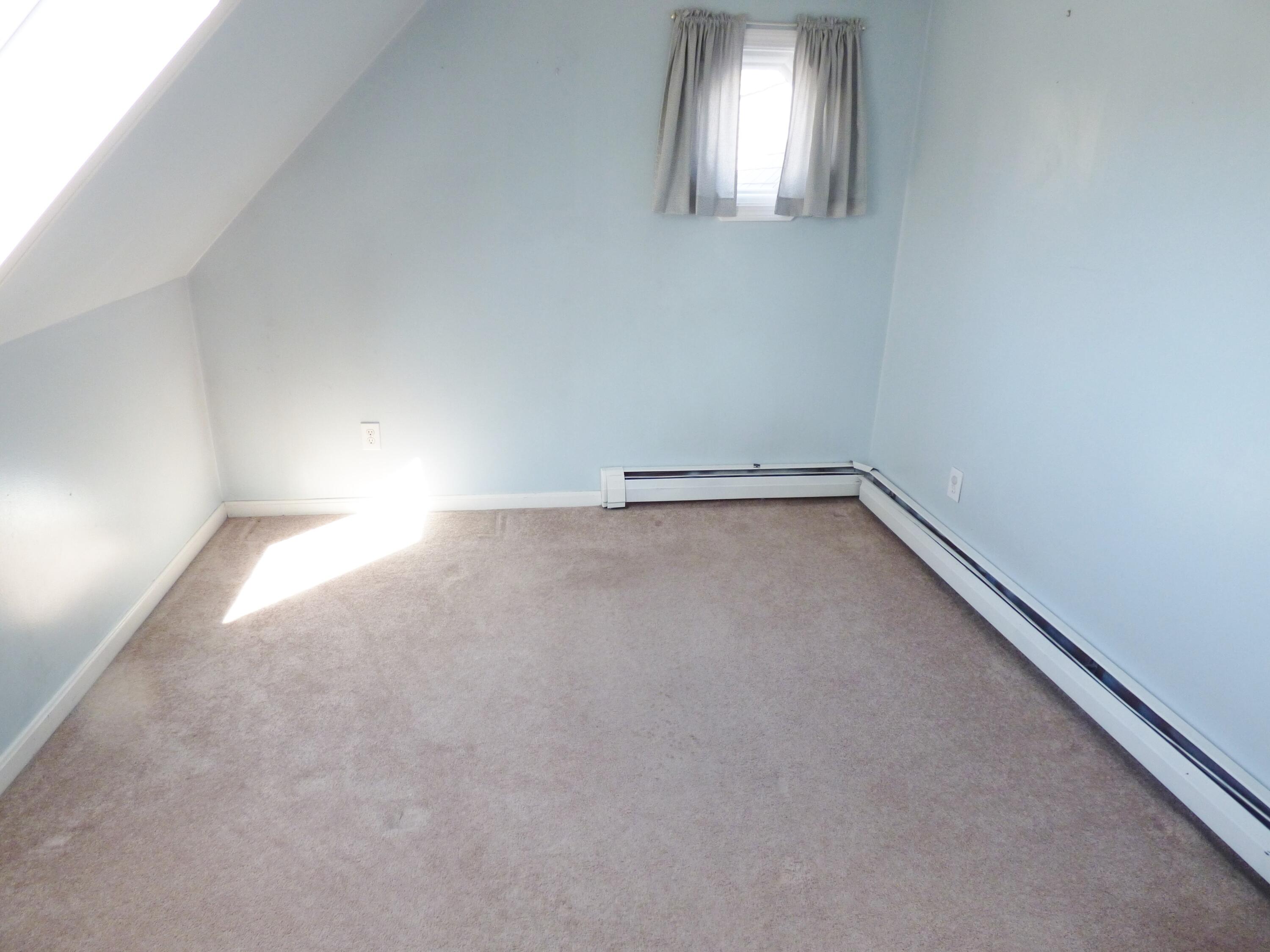 33 Lakeview Drive Sandwich, MA 02563 - Photo 18 of 32 a view of an empty room and window
