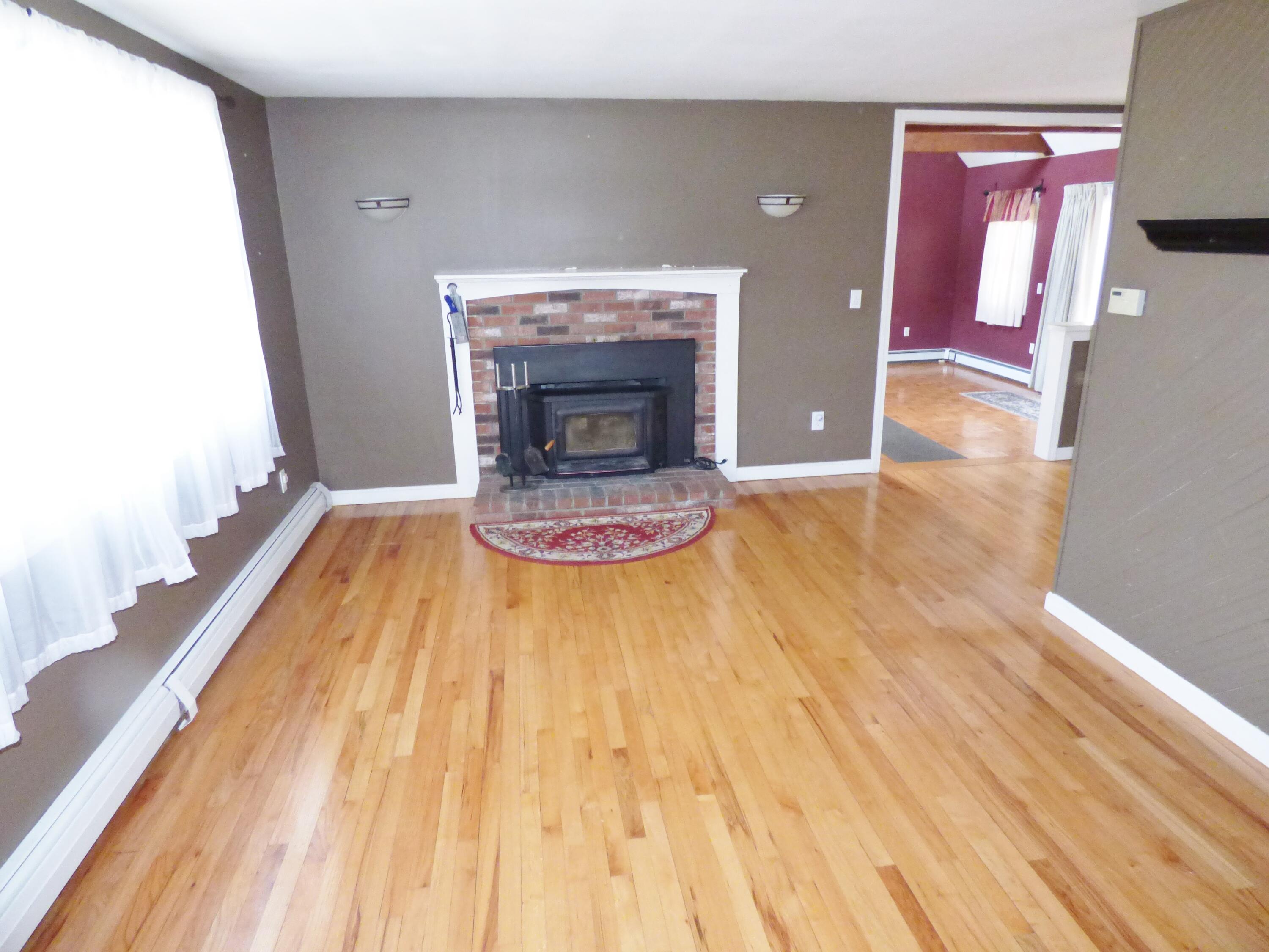 33 Lakeview Drive Sandwich, MA 02563 - Photo 3 of 32 a view of empty room with wooden floor