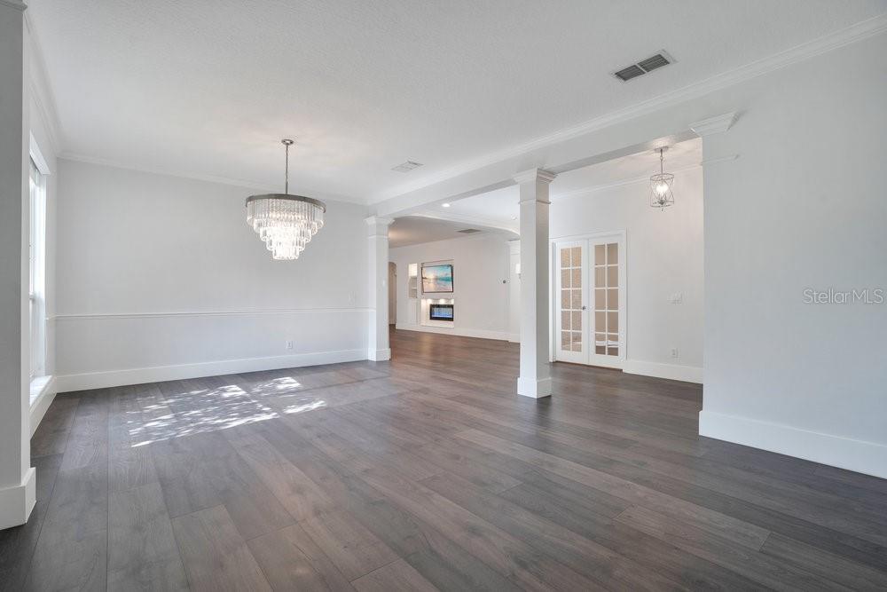 8399 Bowden Way Windermere, FL 34786 - Photo 18 of 59 a view of a livingroom with wooden floor