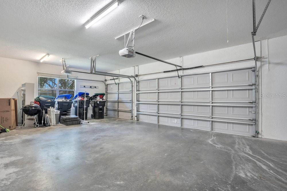 8399 Bowden Way Windermere, FL 34786 - Photo 35 of 59 a view of a garage with furniture and a garage