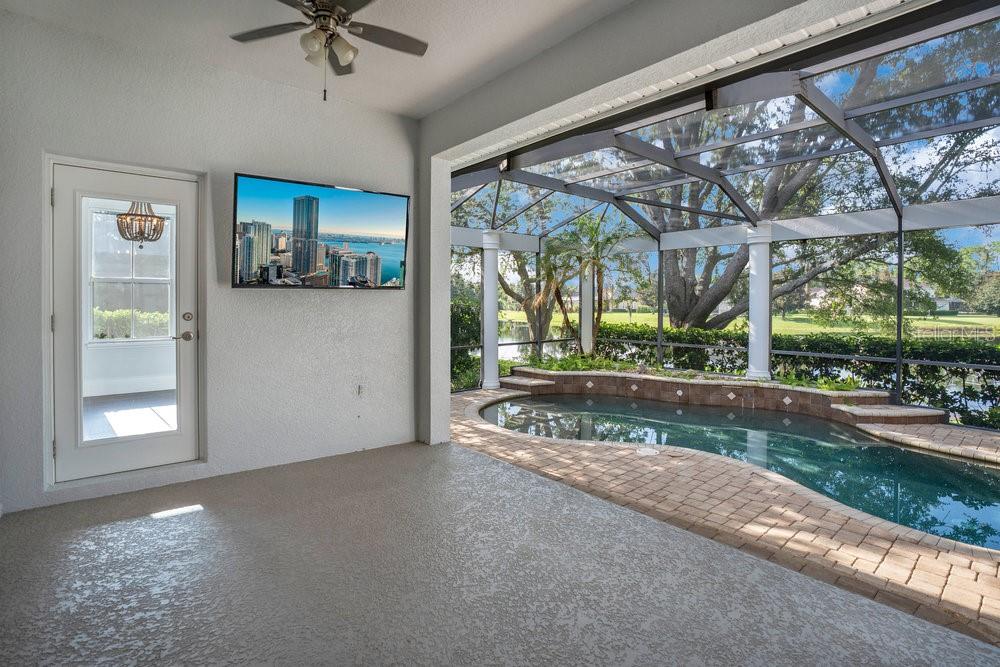 8399 Bowden Way Windermere, FL 34786 - Photo 36 of 59 a view of a porch with furniture and a yard