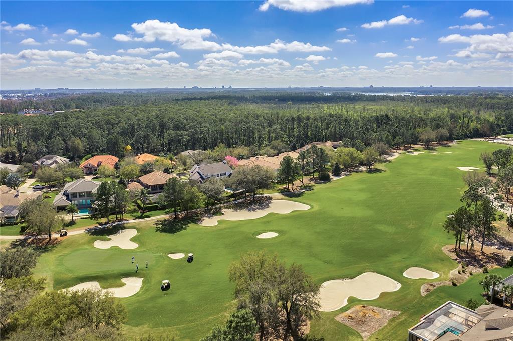 8399 Bowden Way Windermere, FL 34786 - Photo 54 of 59 a view of a lake with a houses