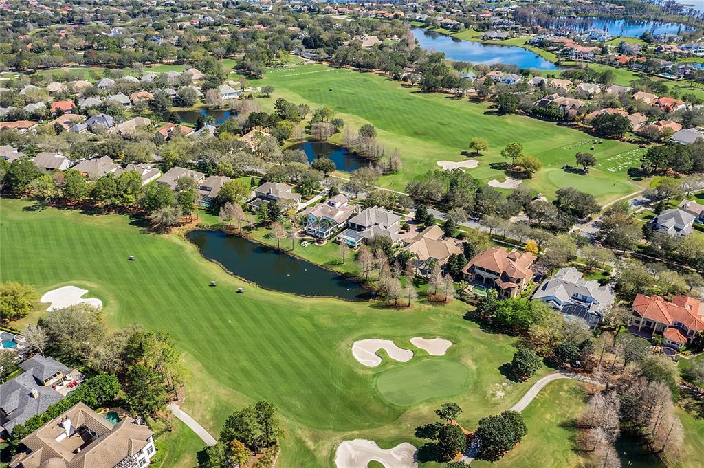 8399 Bowden Way Windermere, FL 34786 - Photo 55 of 59 an aerial view of residential houses with outdoor space and swimming pool