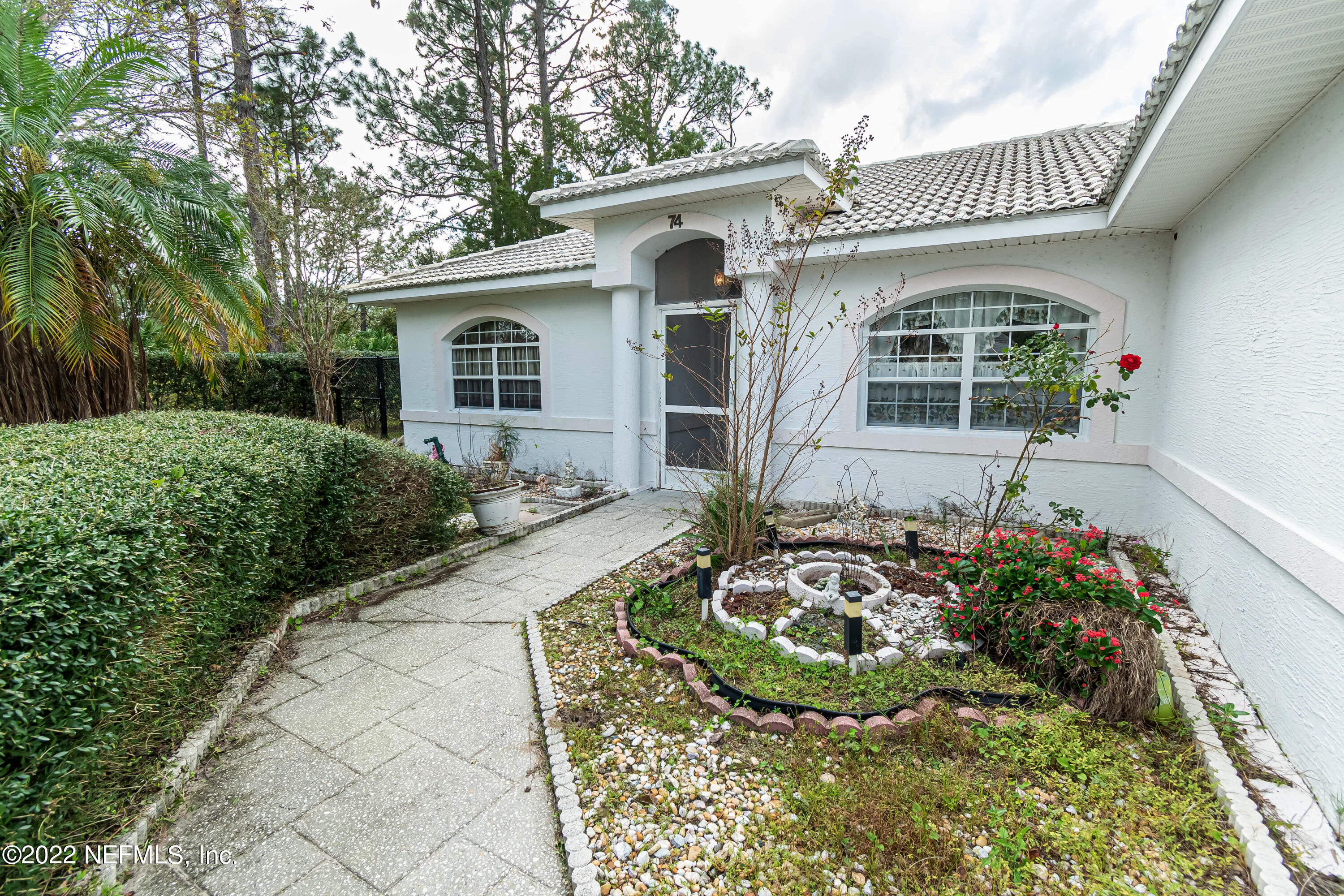 74 Raintree Place Palm Coast, FL 32164 - Photo 5 of 51 frontyard8