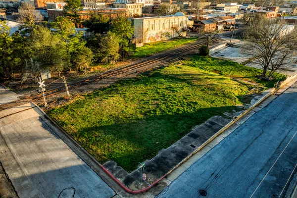 a view of swimming pool from a balcony