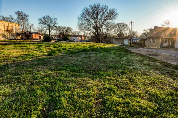 a view of a yard with an outdoor space