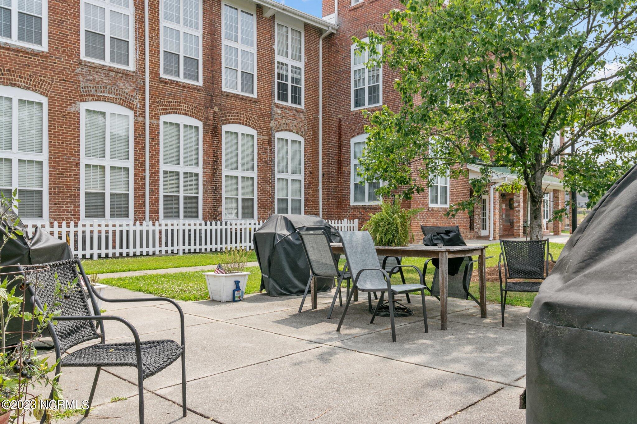 100 Carolyns Mill Place, Unit 109 Rockingham, NC 28379 - Photo 38 of 39 Patio/Grill Area