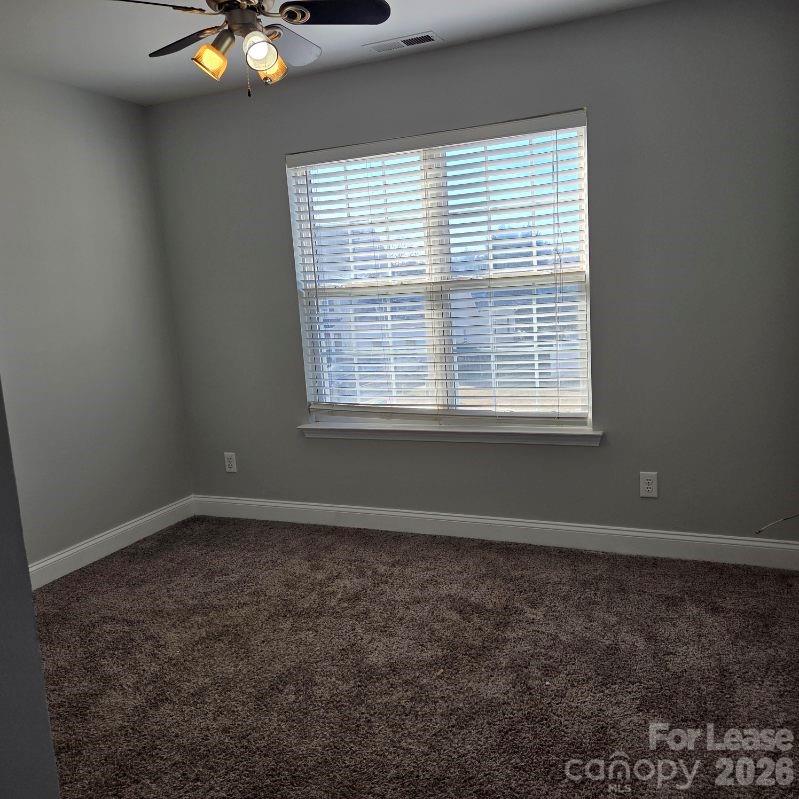 5840 Timbertop Lane Charlotte, NC 28215 - Photo 21 of 34 an empty room with a window