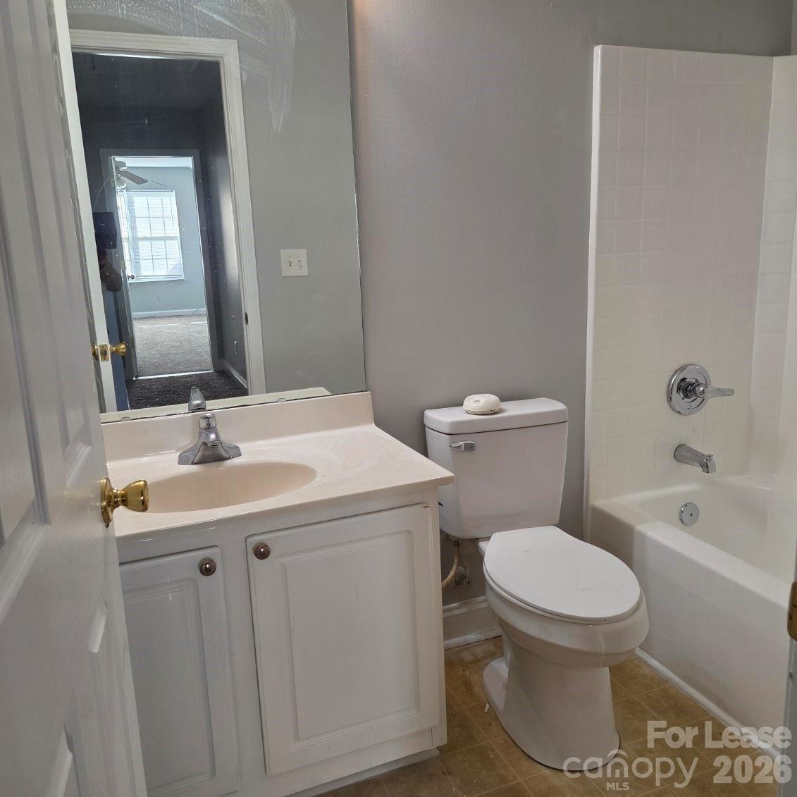 5840 Timbertop Lane Charlotte, NC 28215 - Photo 26 of 34 a bathroom with a sink toilet and shower