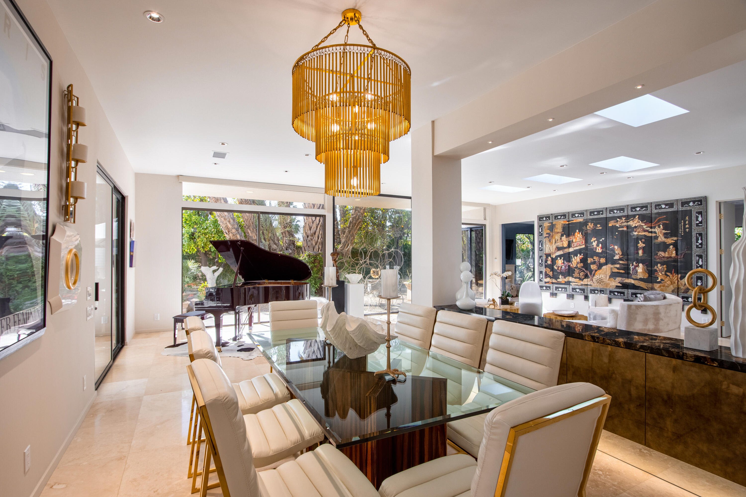 37355 Palm View Road Rancho Mirage, CA 92270 - Photo 15 of 49 a living room with fireplace furniture and a chandelier