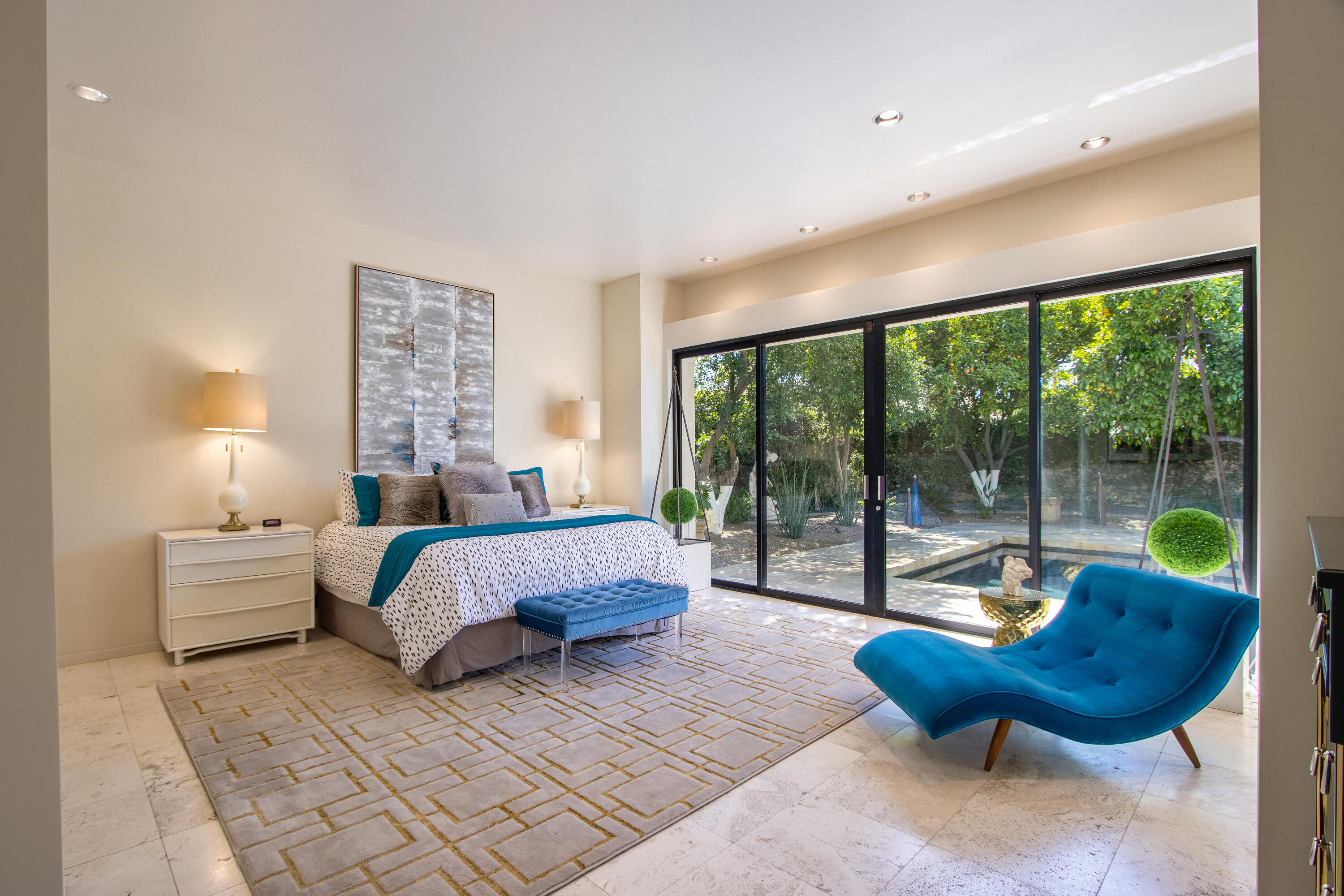 37355 Palm View Road Rancho Mirage, CA 92270 - Photo 23 of 49 a spacious bedroom with a bed and large windows