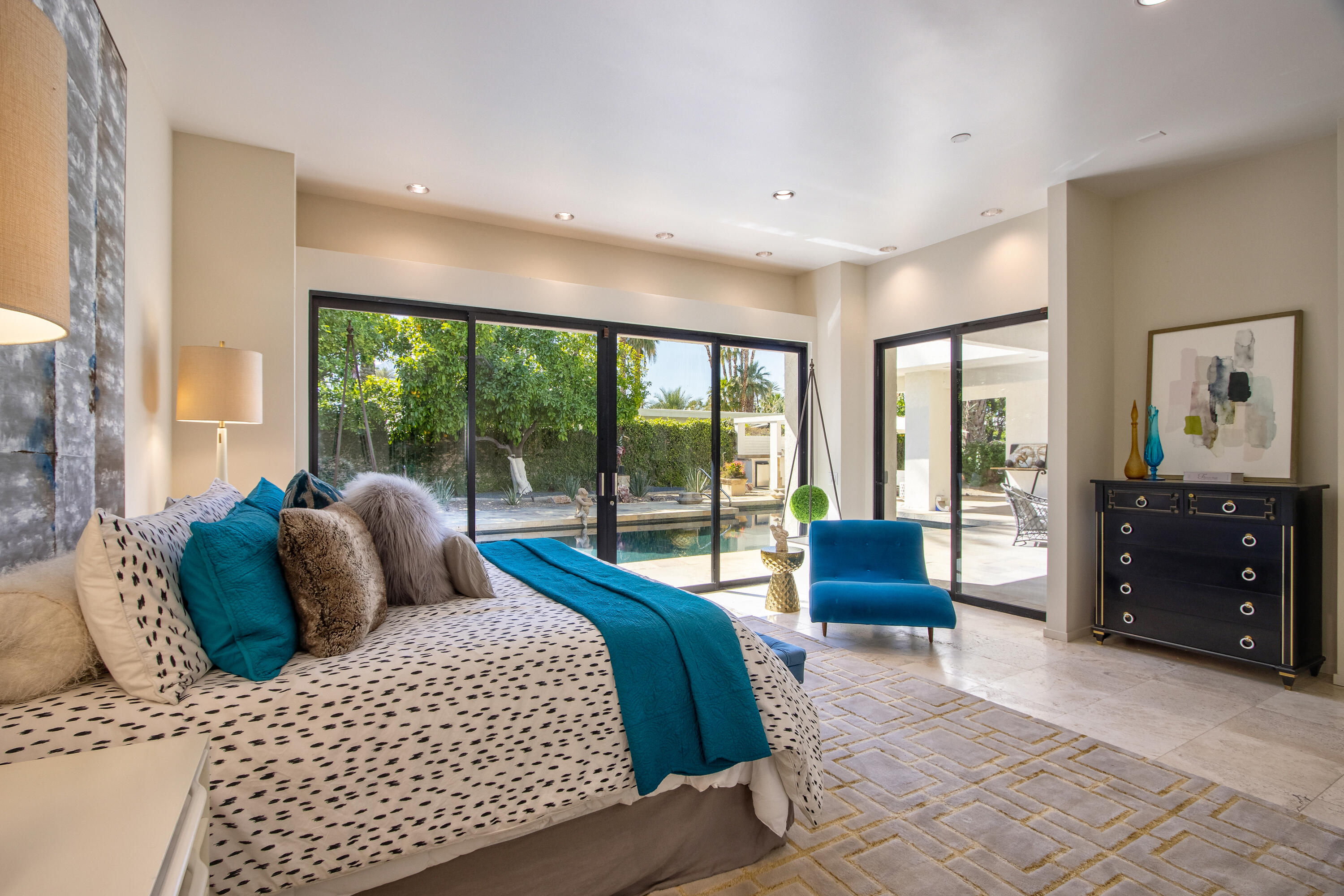 37355 Palm View Road Rancho Mirage, CA 92270 - Photo 24 of 49 a bedroom with a large bed and a large window