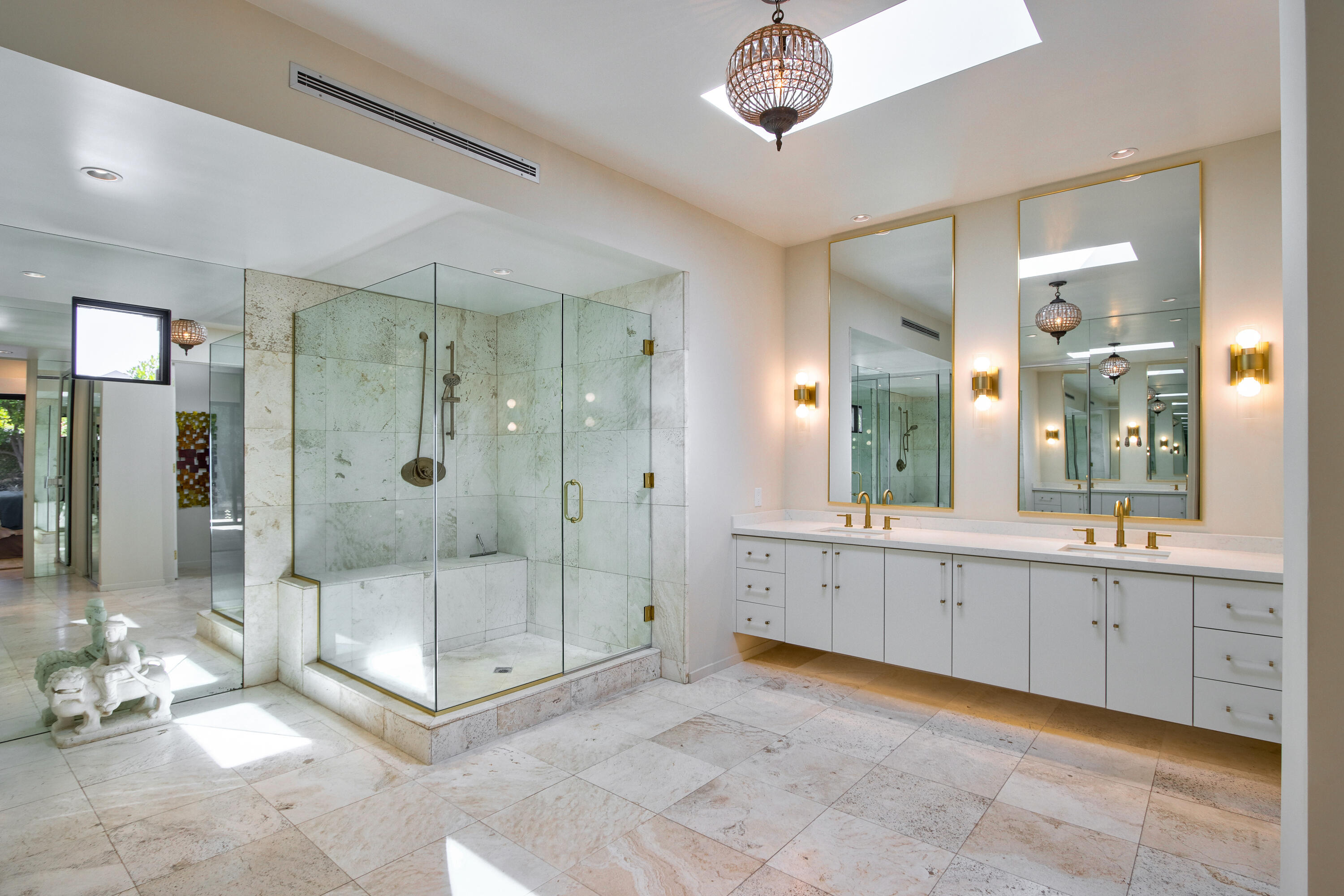 37355 Palm View Road Rancho Mirage, CA 92270 - Photo 25 of 49 a bathroom with a shower a mirror and a sink