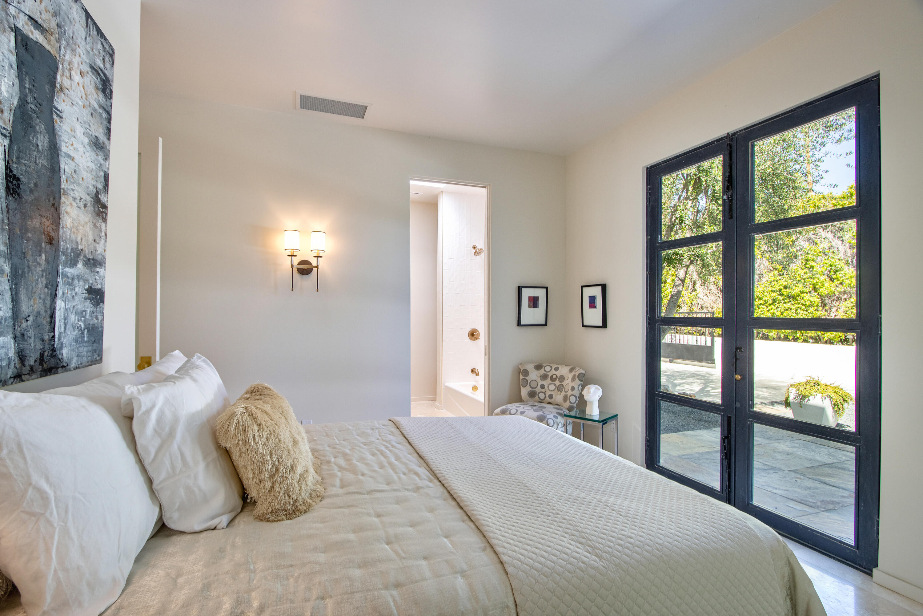 37355 Palm View Road Rancho Mirage, CA 92270 - Photo 29 of 49 a bedroom with a large bed and a window