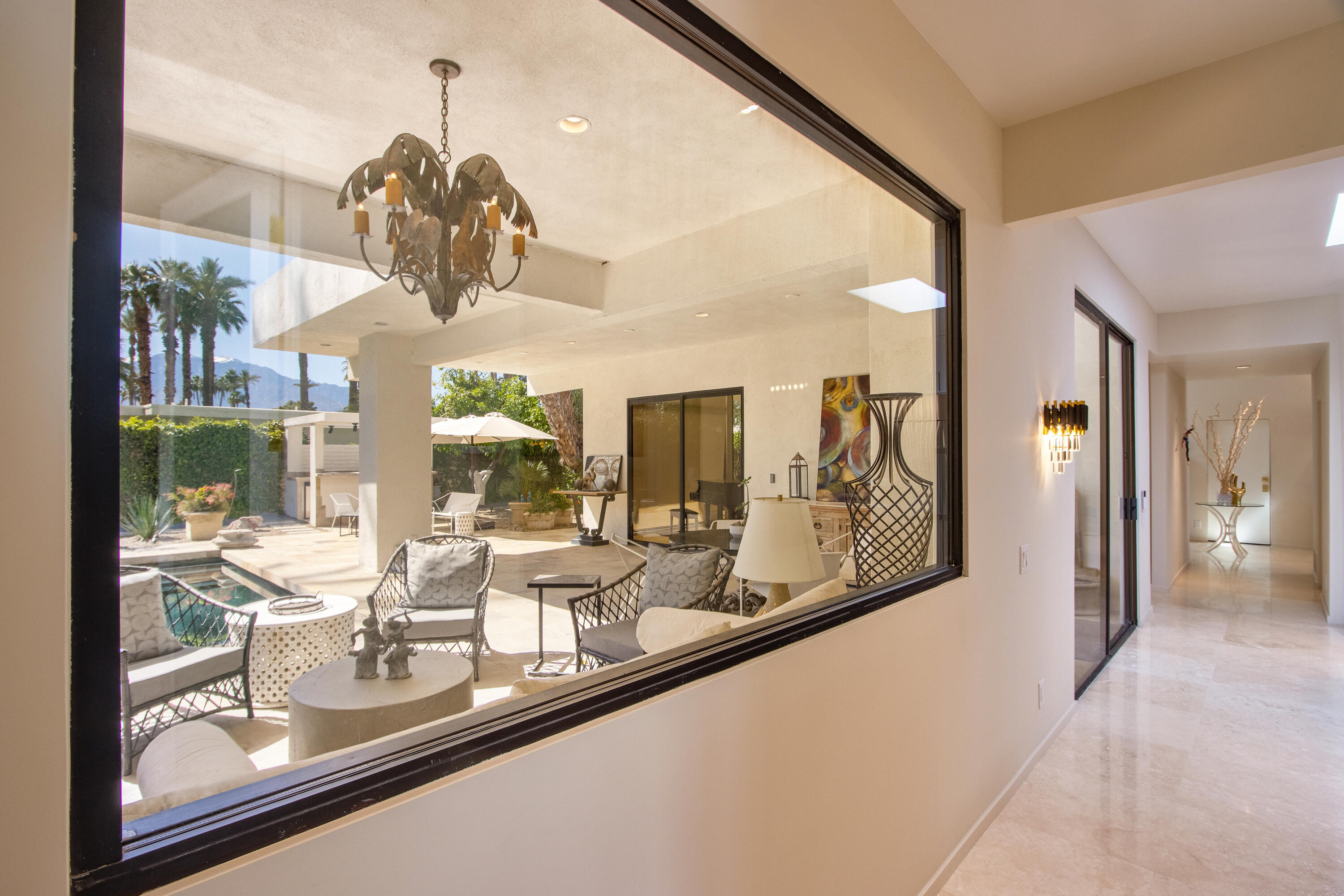37355 Palm View Road Rancho Mirage, CA 92270 - Photo 32 of 49 a view of a living room and dining room