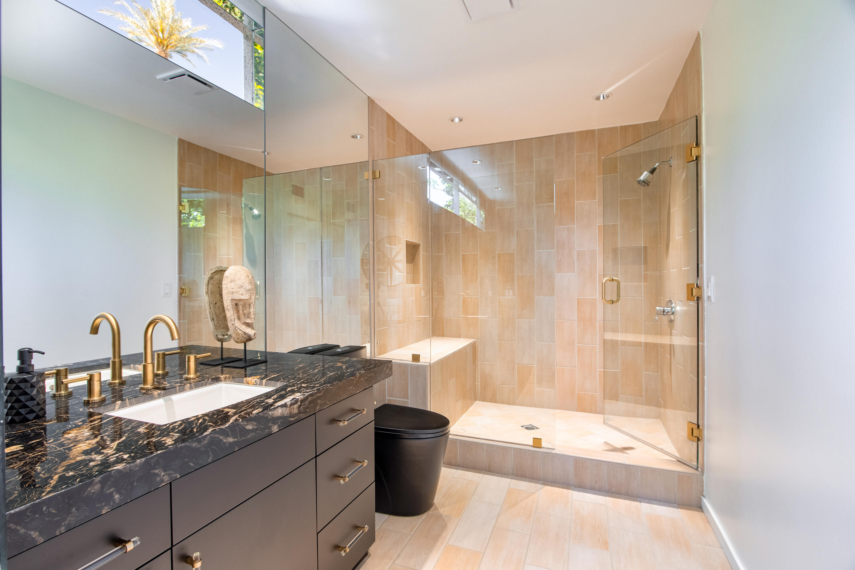 37355 Palm View Road Rancho Mirage, CA 92270 - Photo 34 of 49 a bathroom with a granite countertop sink a toilet a mirror and shower