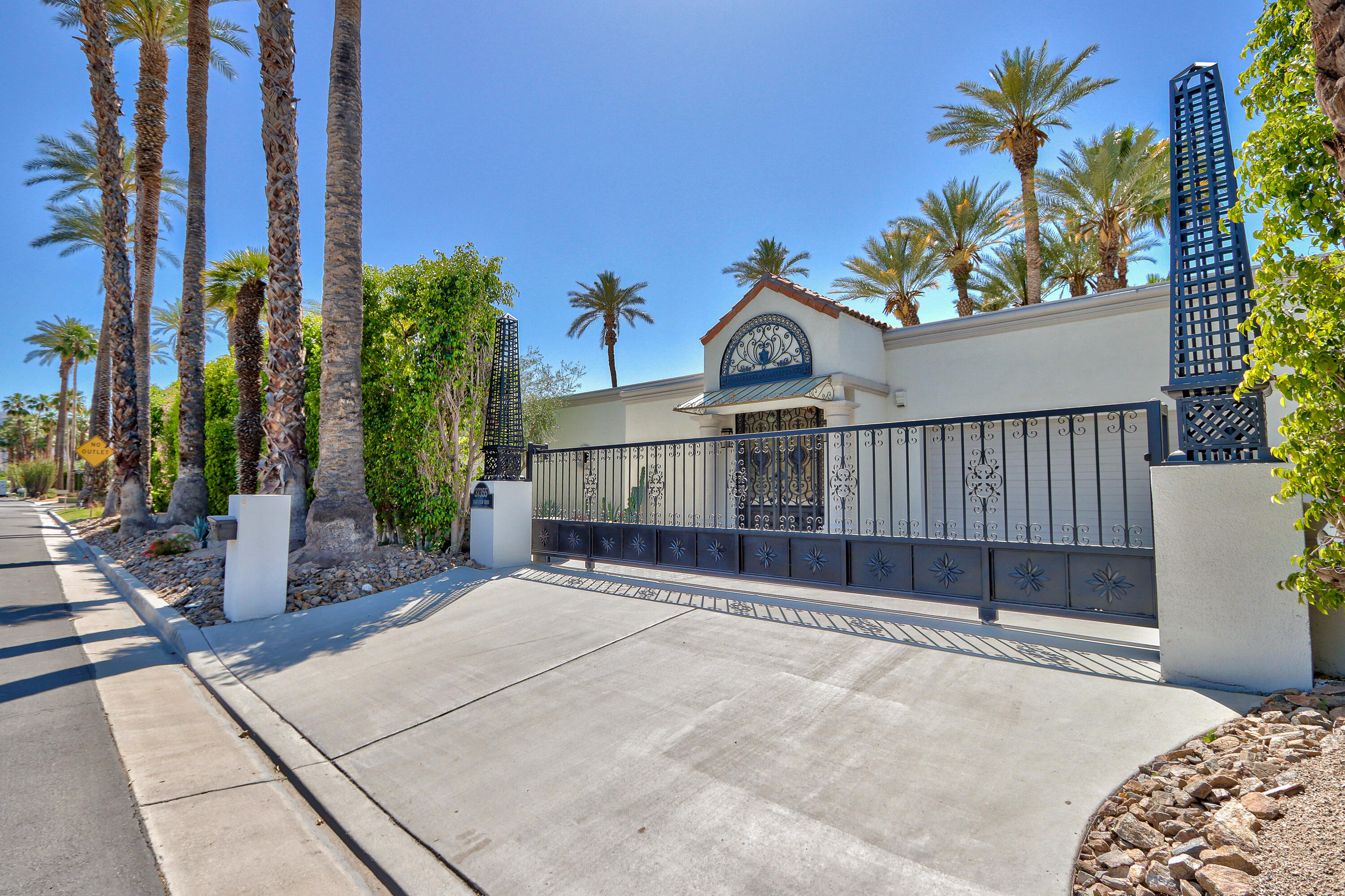 37355 Palm View Road Rancho Mirage, CA 92270 - Photo 7 of 49 a view of balcony with a potted plant and sign board