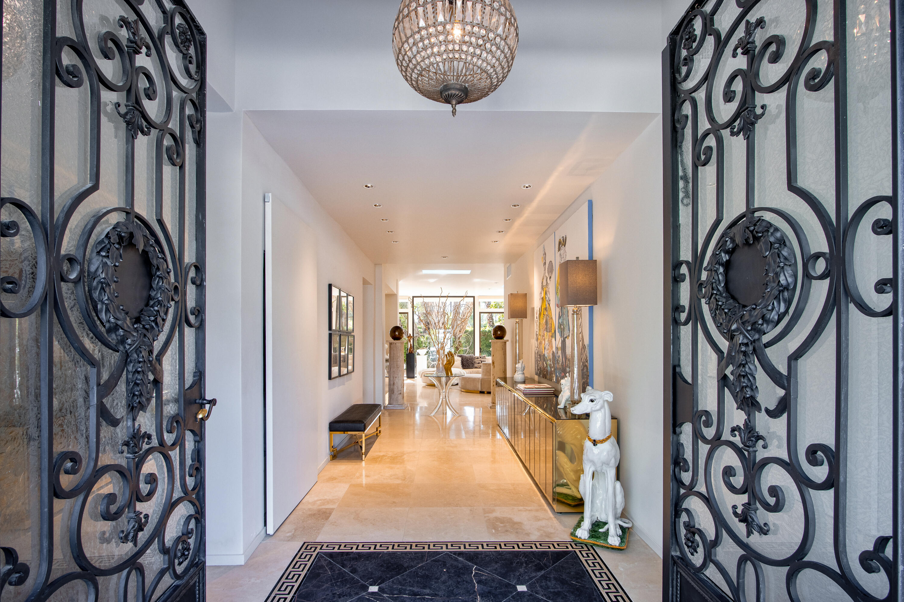 37355 Palm View Road Rancho Mirage, CA 92270 - Photo 8 of 49 a view of a hallway with washer and dryer