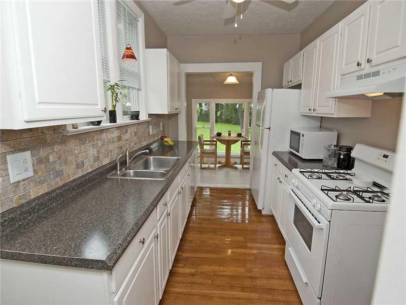 153 Easley Road Pittsburgh, PA 15237 - Photo 4 of 12 Kitchen. The hardwood flooring continues through the Kitchen,