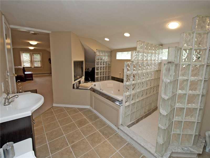153 Easley Road Pittsburgh, PA 15237 - Photo 9 of 12 Master Bath/Spa. There is plenty of room to relax in the whirlpool tub and enjoy a fire in the fireplace at the same time!