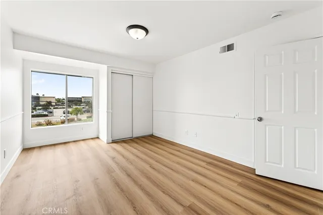 an aerial view of a house with a garden and swimming pool