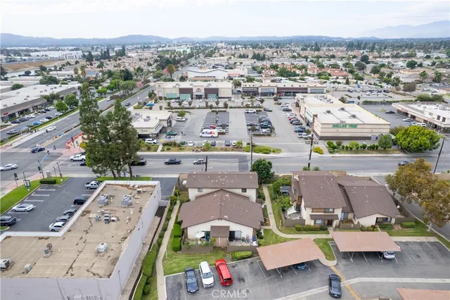 an aerial view of a house with a swimming pool