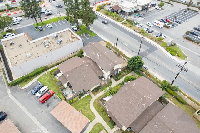 a view of a backyard with sitting area