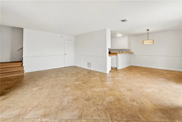 a view of a kitchen with a sink