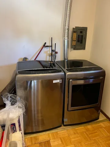 a utility room with dryer and washer
