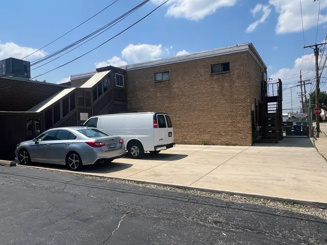 a car parked in front of a house