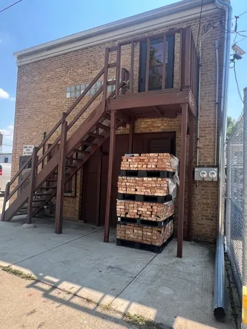 a view of room with stairs and a furniture