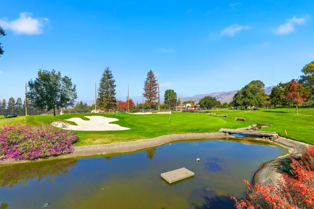 a view of a lake with a yard