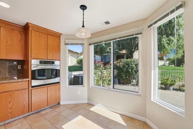 a view interior of a house and kitchen view with wooden floor