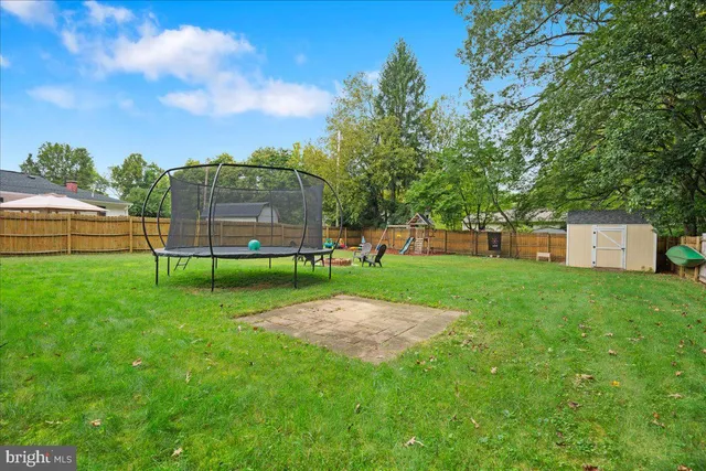 a backyard of a house with seating space