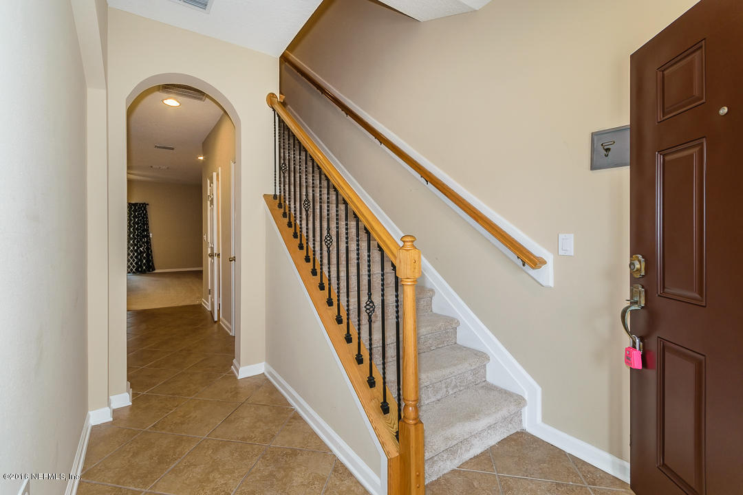 12991 Spring Rain Road Jacksonville, FL 32258 - Photo 12 of 23 a view of entryway and hall with wooden floor