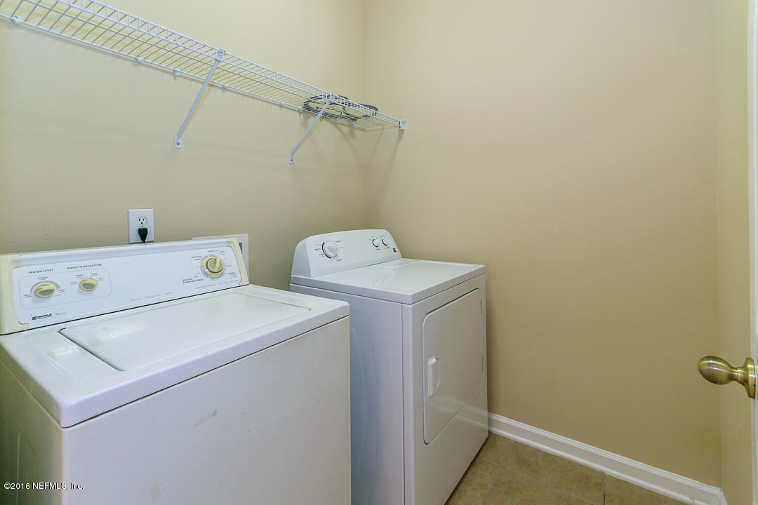 12991 Spring Rain Road Jacksonville, FL 32258 - Photo 16 of 23 a utility room with dryer and washer
