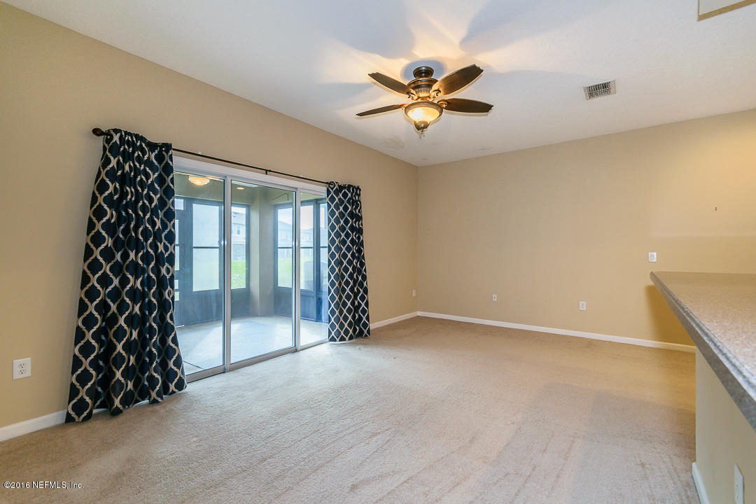12991 Spring Rain Road Jacksonville, FL 32258 - Photo 18 of 23 a view of an empty room with a window