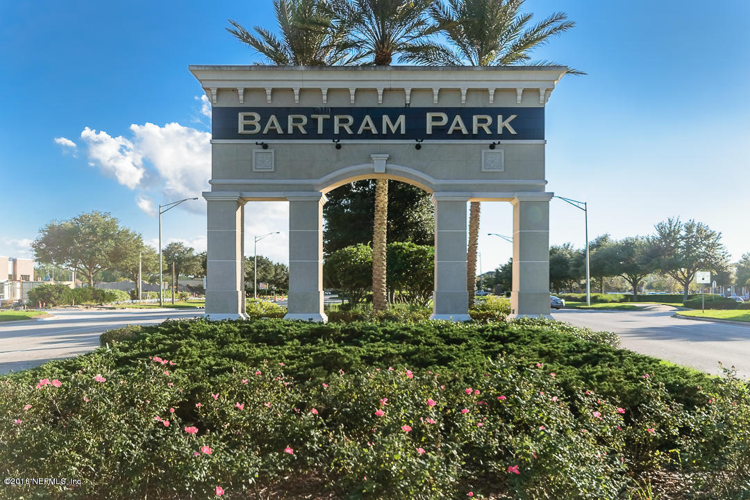 12991 Spring Rain Road Jacksonville, FL 32258 - Photo 23 of 23 a view of a building with a garden