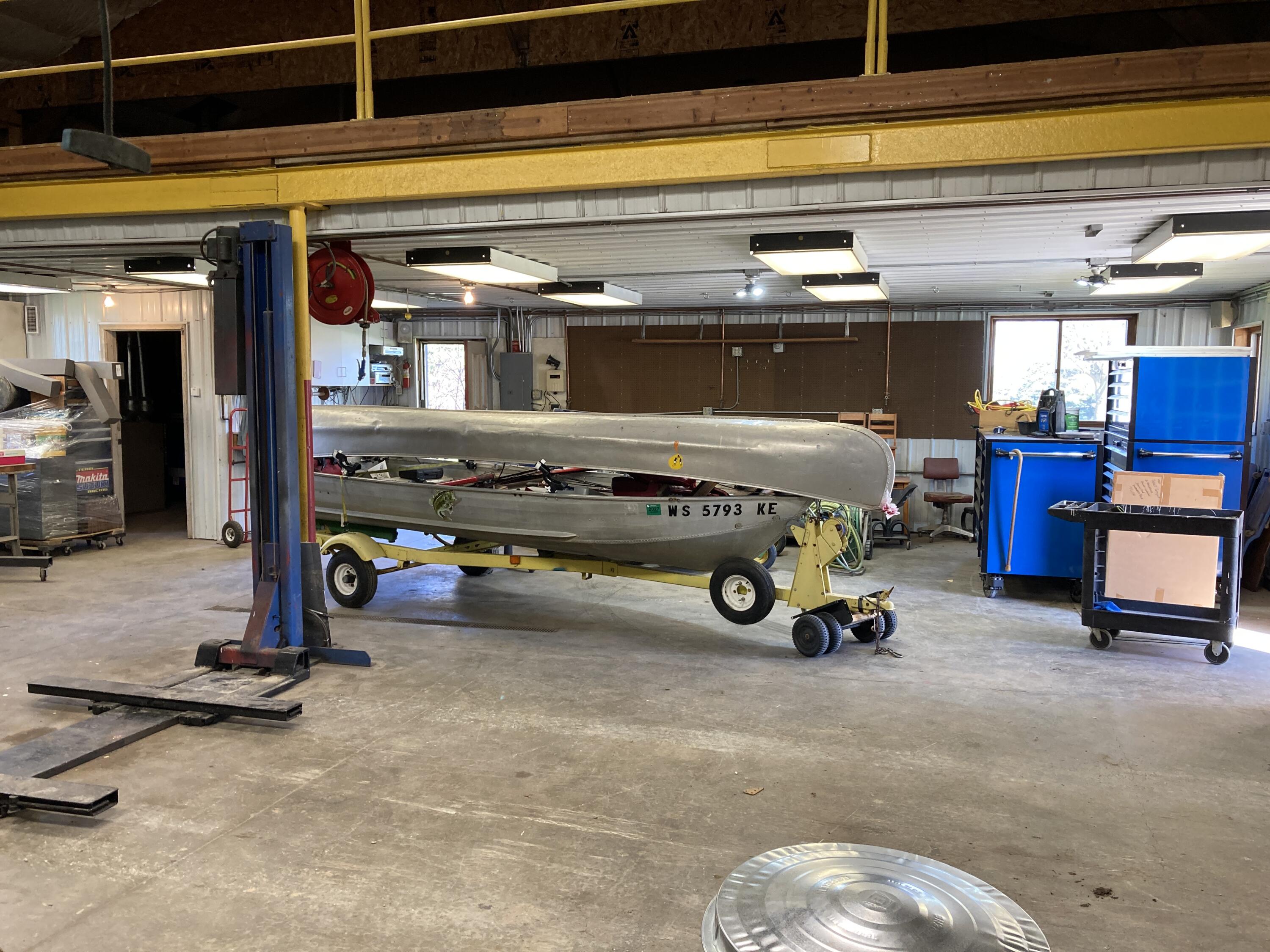 W4918 County Road North Lyndon, WI 53093 - Photo 20 of 23 Work Shop w/Storage Loft Overhead