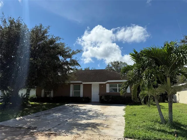 a view of house with outdoor space