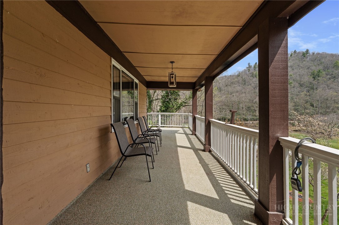2345 Watauga River Road Sugar Grove, NC 28679 - Photo 45 of 50 a view of two chairs in the balcony