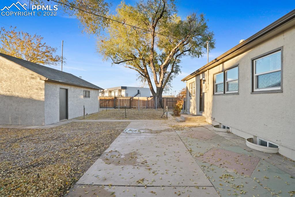 1901 Ridgewood Lane Pueblo, CO 81005 - Photo 25 of 29 a view of a yard with a house