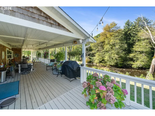 a view of a yard with large trees