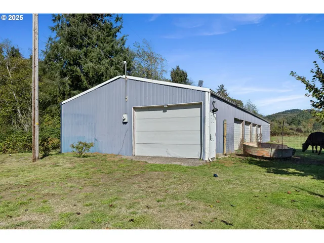 a backyard of a house with a yard and sitting area