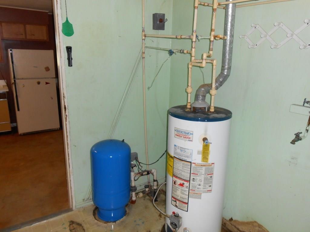 540 Washington Road Waynesburg, PA 15370 - Photo 10 of 15 Laundry room with well pressure tank and hot water tank leads to garage.
