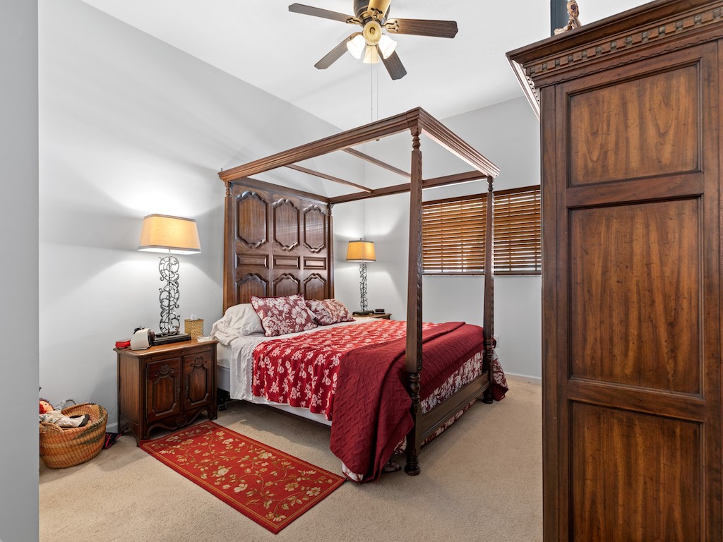 572 7th Square Southwest, Unit 101 Vero Beach, FL 32962 - Photo 20 of 34 a bedroom with a bed and a window