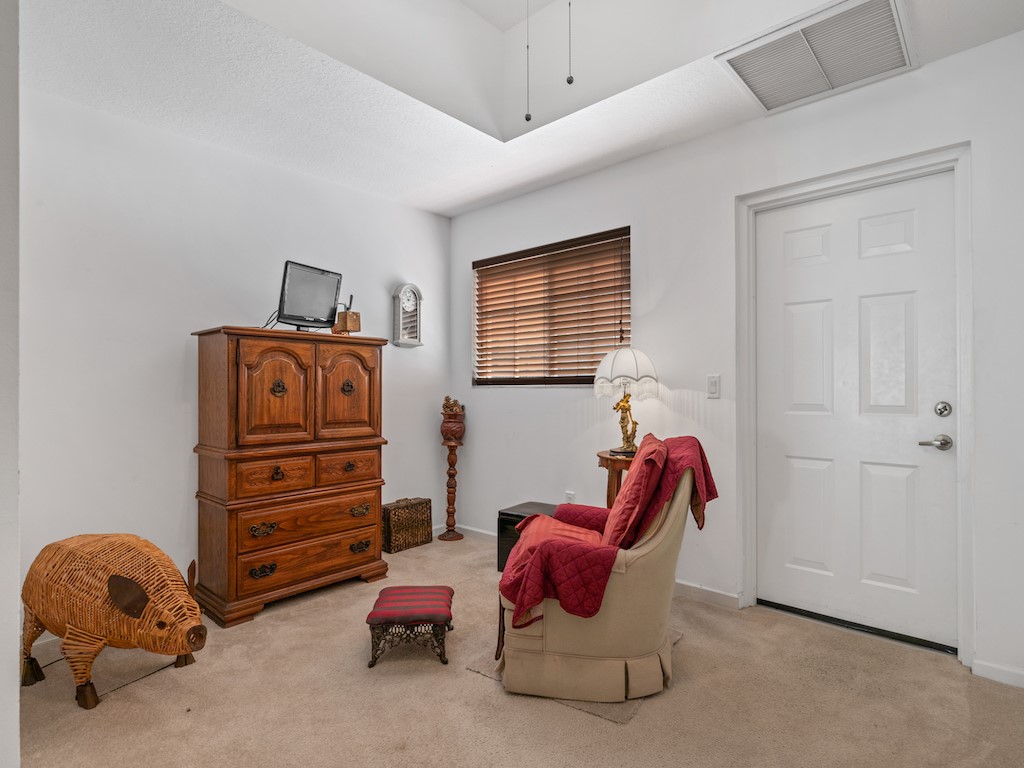 572 7th Square Southwest, Unit 101 Vero Beach, FL 32962 - Photo 24 of 34 a living room with furniture and a window