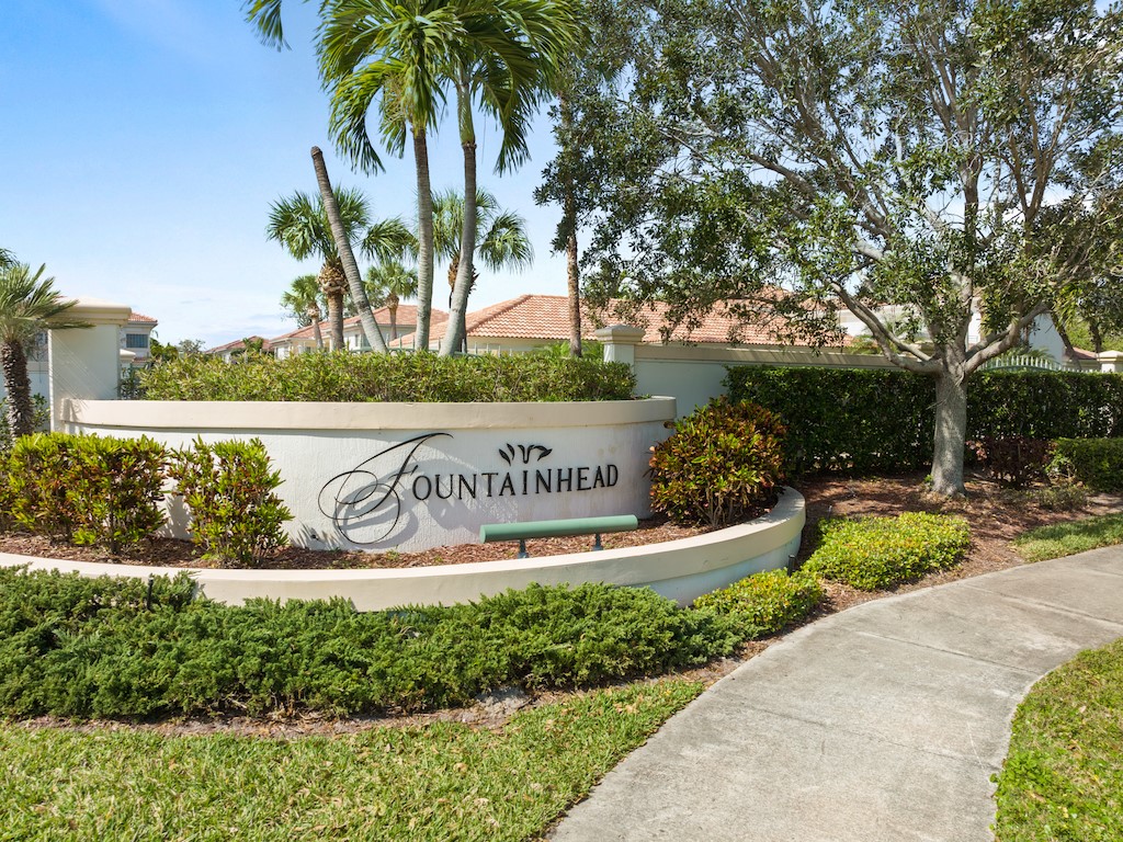 572 7th Square Southwest, Unit 101 Vero Beach, FL 32962 - Photo 33 of 34 a sign on the side of a building
