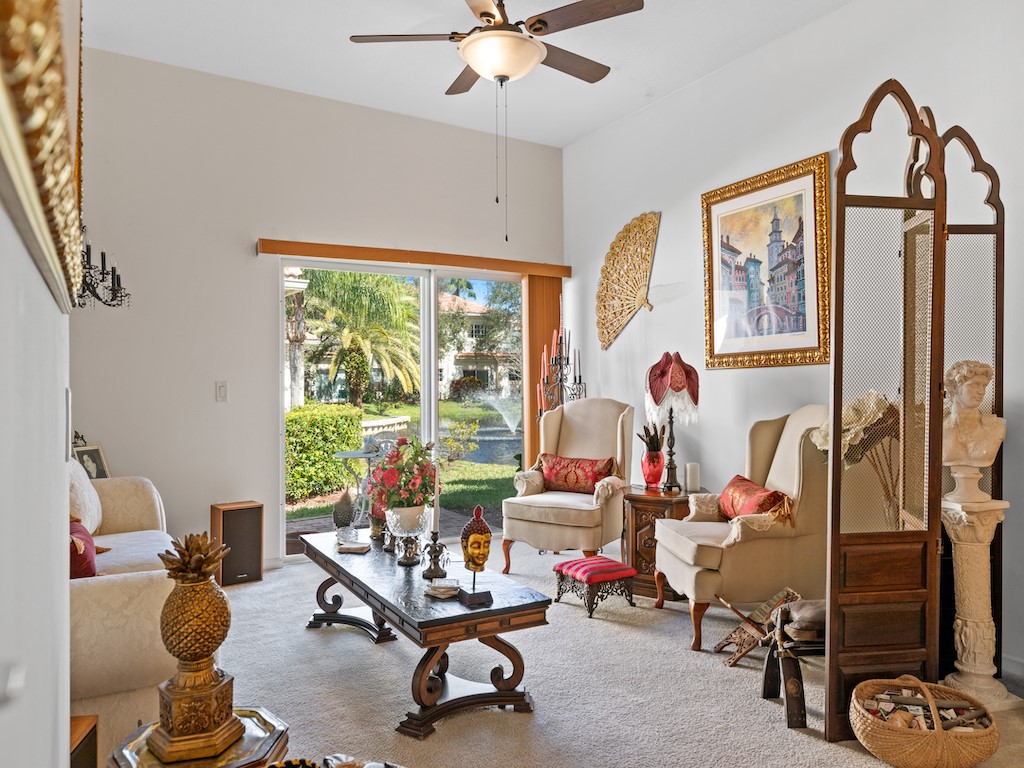 572 7th Square Southwest, Unit 101 Vero Beach, FL 32962 - Photo 9 of 34 a living room with furniture and a window