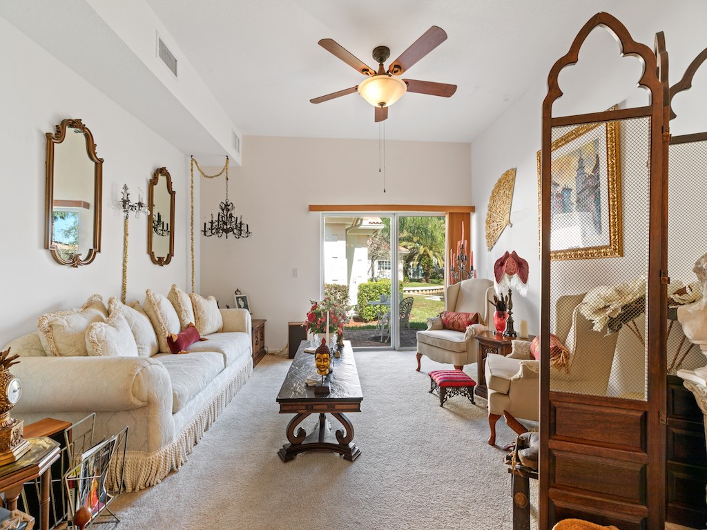 572 7th Square Southwest, Unit 101 Vero Beach, FL 32962 - Photo 10 of 34 a living room with furniture and a window